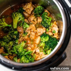 Instant Pot with cooked chicken and broccoli