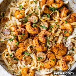 skillet with fettuccine, shrimp and chicken sausage