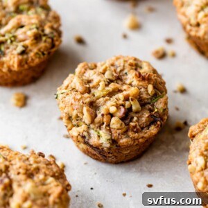 zucchini walnut muffins on a table