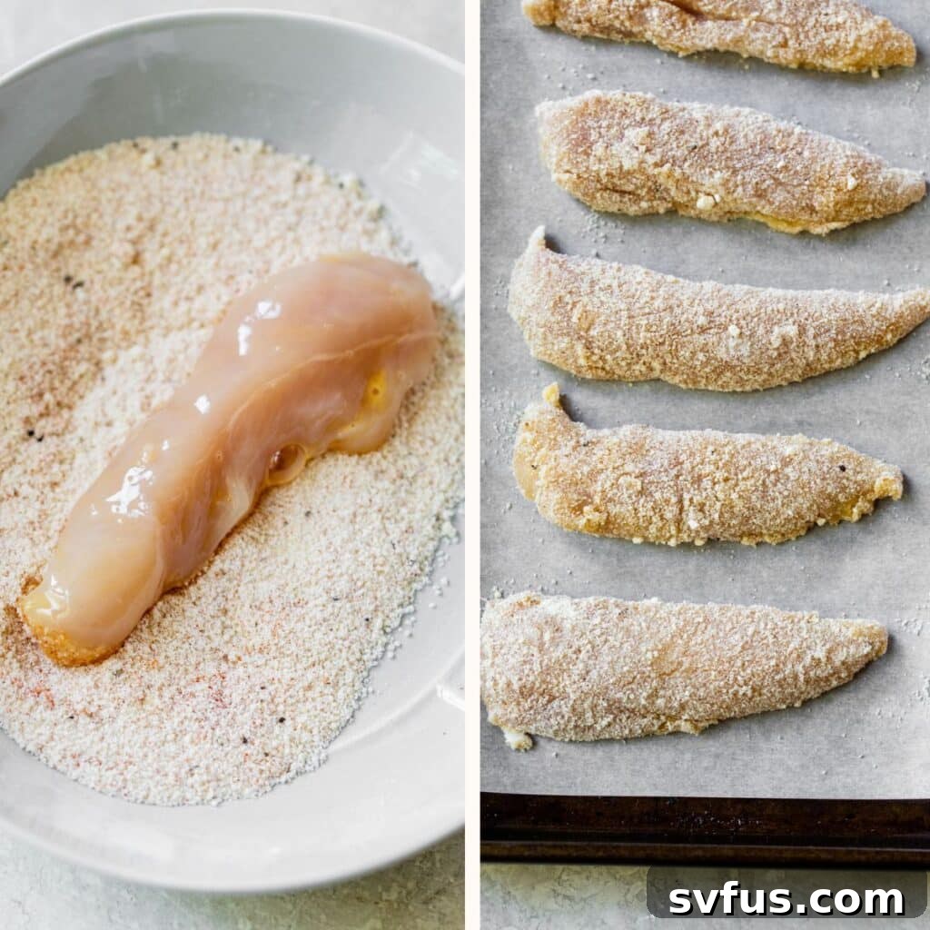 Raw chicken tenders being coated in a flour mixture, illustrating the breading process on a clean surface.