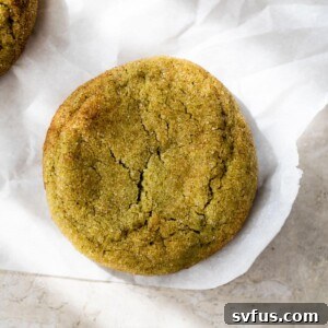Close-up photo of a vibrant green matcha snickerdoodle cookie.