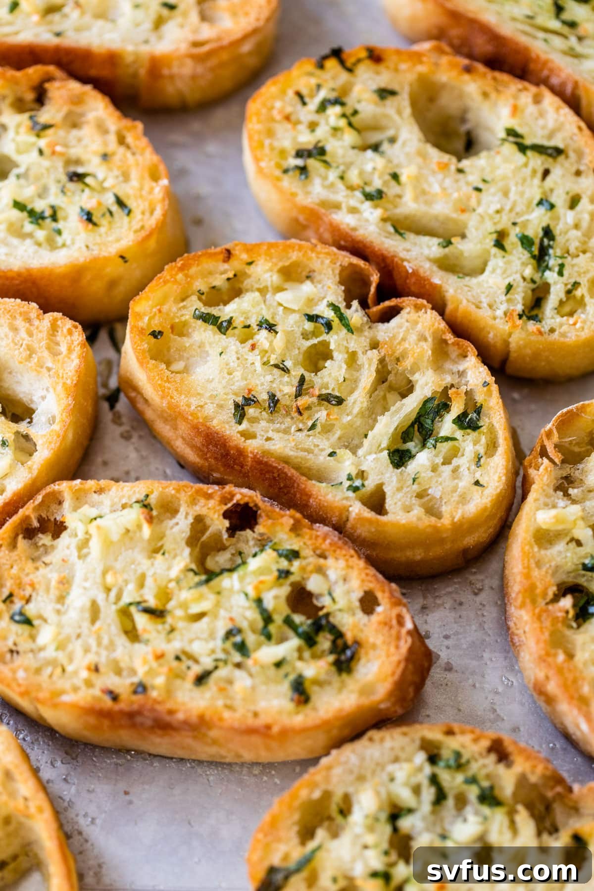 garlic bread on a baking sheet