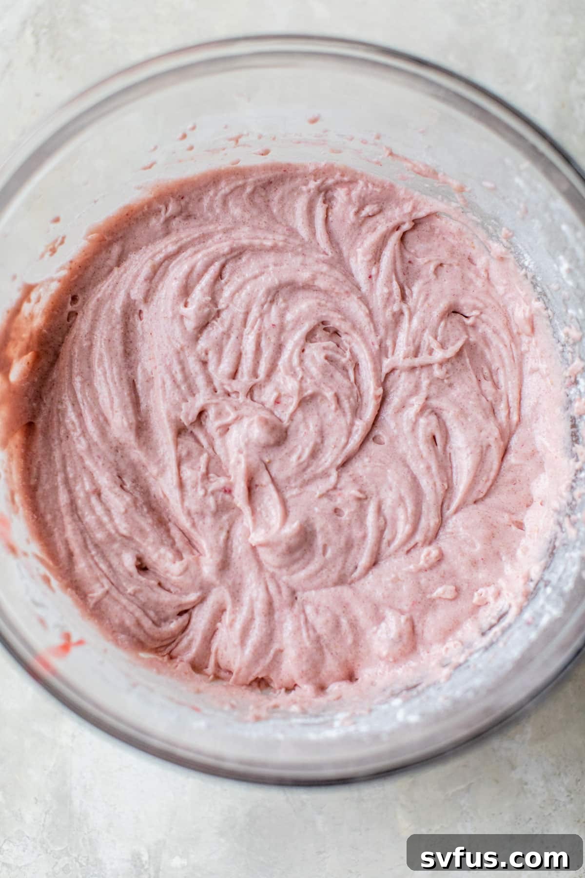 bowl with pink cake batter inside