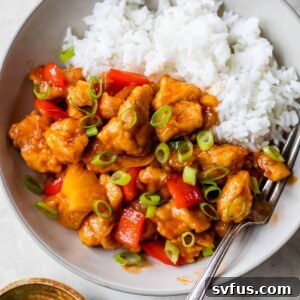 bowl of rice with sweet and sour chicken