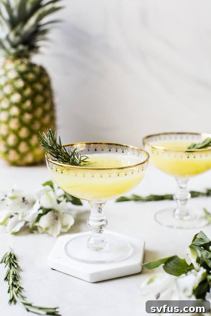 Pouring Pineapple Ginger Punch into a glass