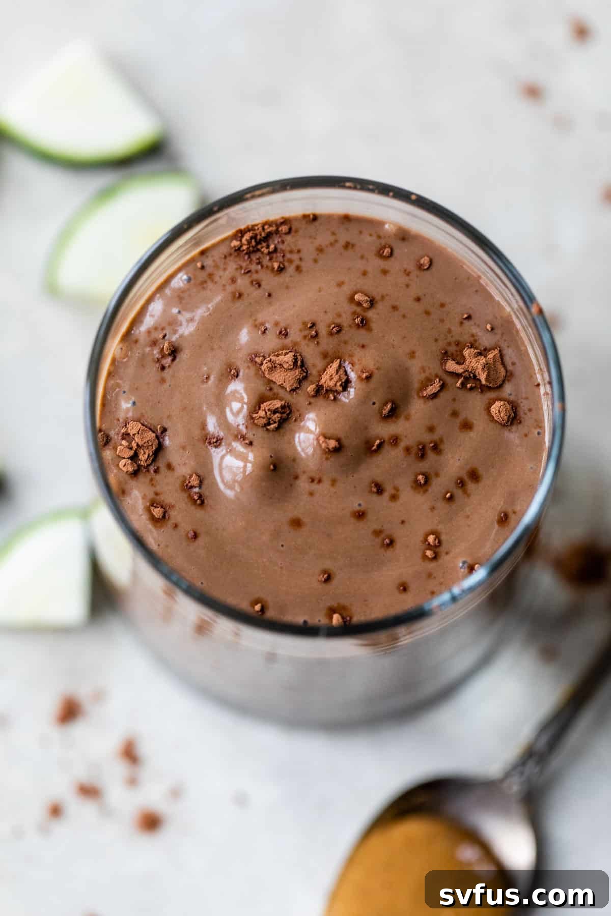 An inviting overview of the finished chocolate zucchini smoothie served elegantly in a clear glass