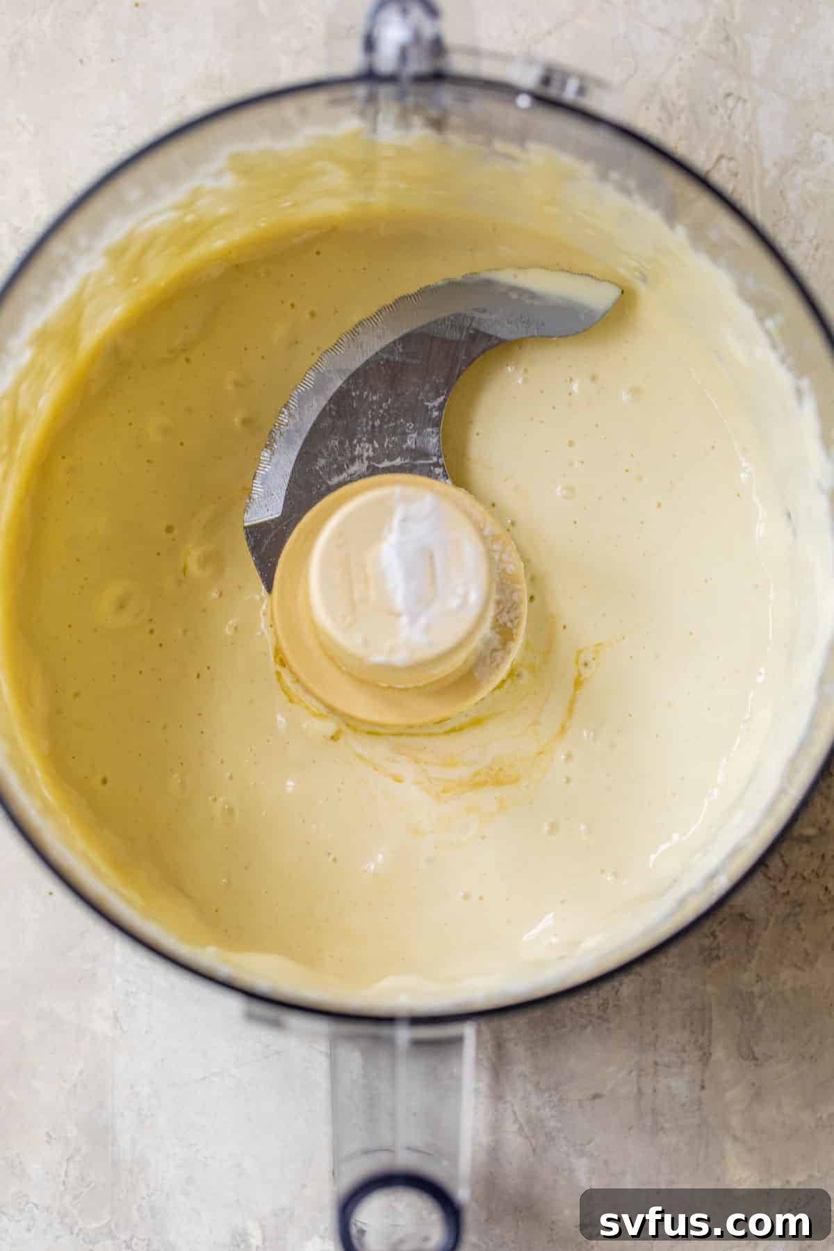 All the dressing ingredients for healthy potato salad added to a food processor and blended until smooth and creamy.