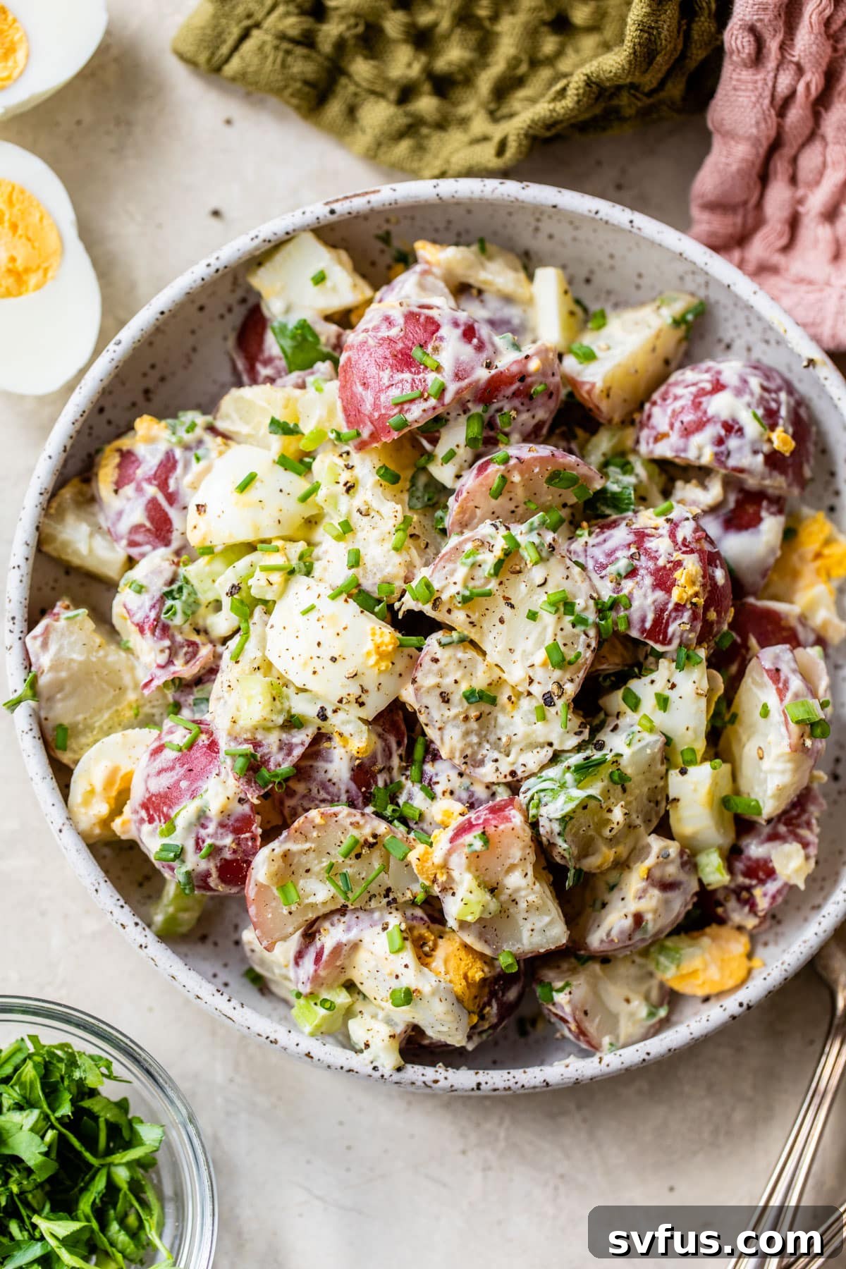 An appetizing overview of the healthy potato salad in a serving bowl, garnished and ready to be enjoyed.