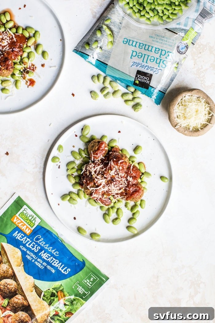 Delicious 10-minute meatless meatballs served with edamame and marinara sauce on a plate, ready to eat.