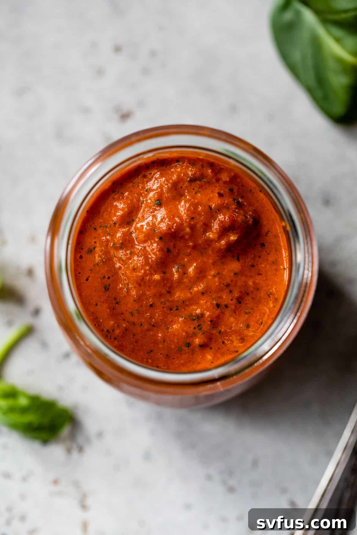 overview of red pepper pesto in a jar