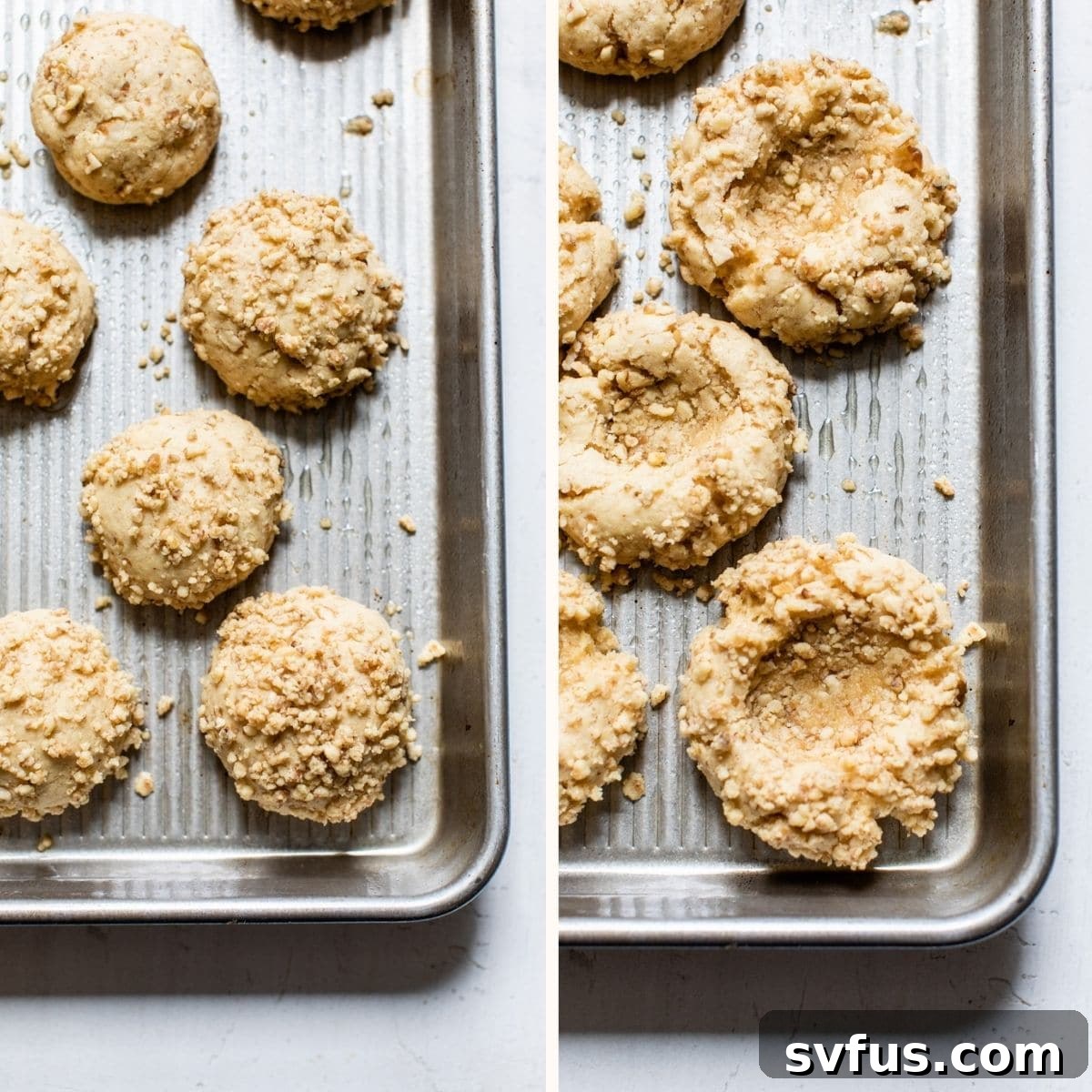 Freshly baked thumbprint cookies with perfect circular indentations visible, still resting on the baking sheet