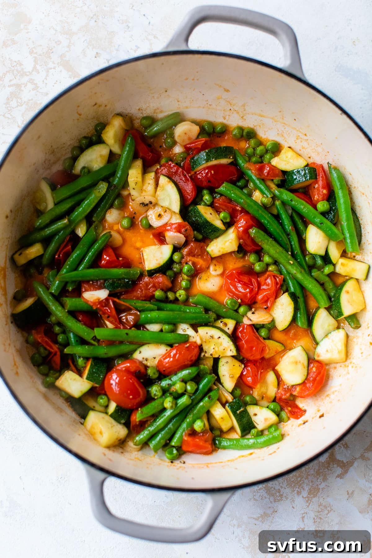 vegetables cooking in a dutch oven