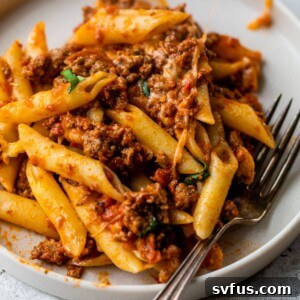 vegan baked ziti on a plate with a fork