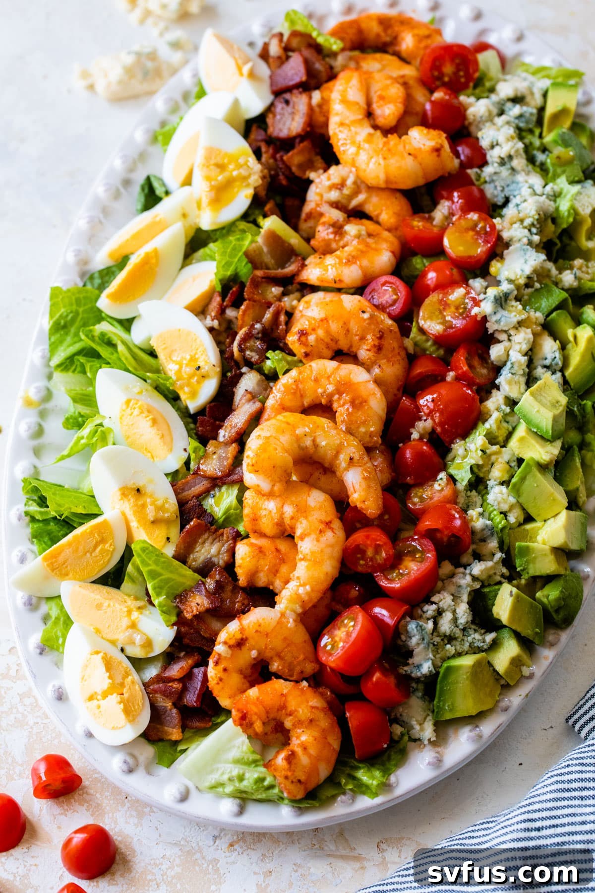 shrimp cobb salad on a serving platter
