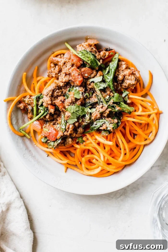 Final plated Beef Ragu with Sweet Potato Noodles, garnished for serving