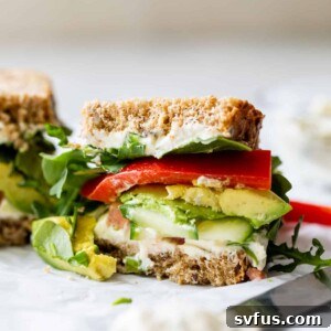side view of a veggie sandwich cut in half