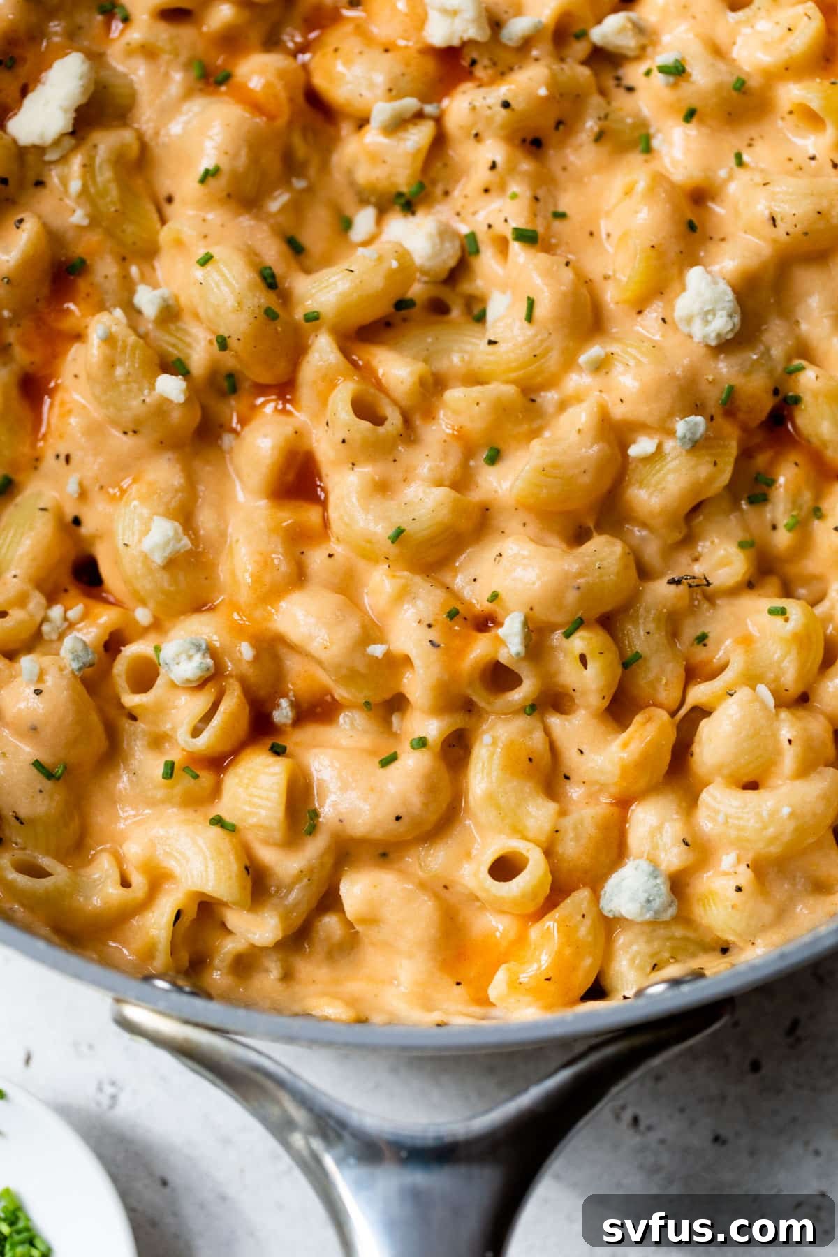 close-up of buffalo mac and cheese in a large skillet