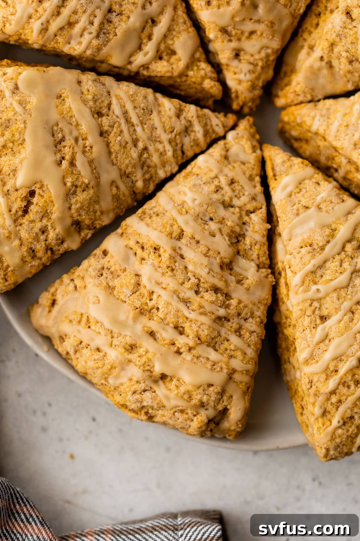 scones with a glaze on a plate
