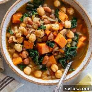 A bowl of vegan three bean soup, garnished and ready to eat.