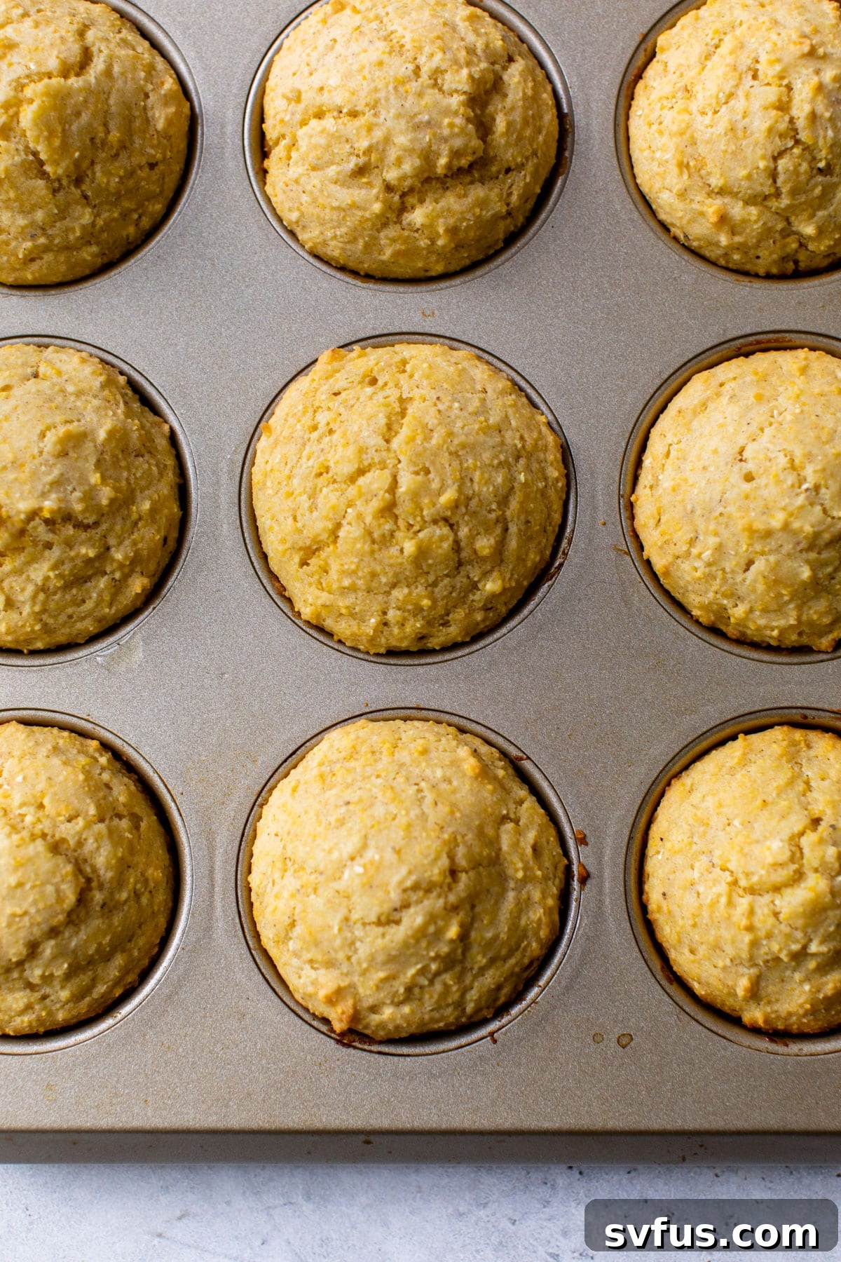 corn muffins baked in a muffin tin