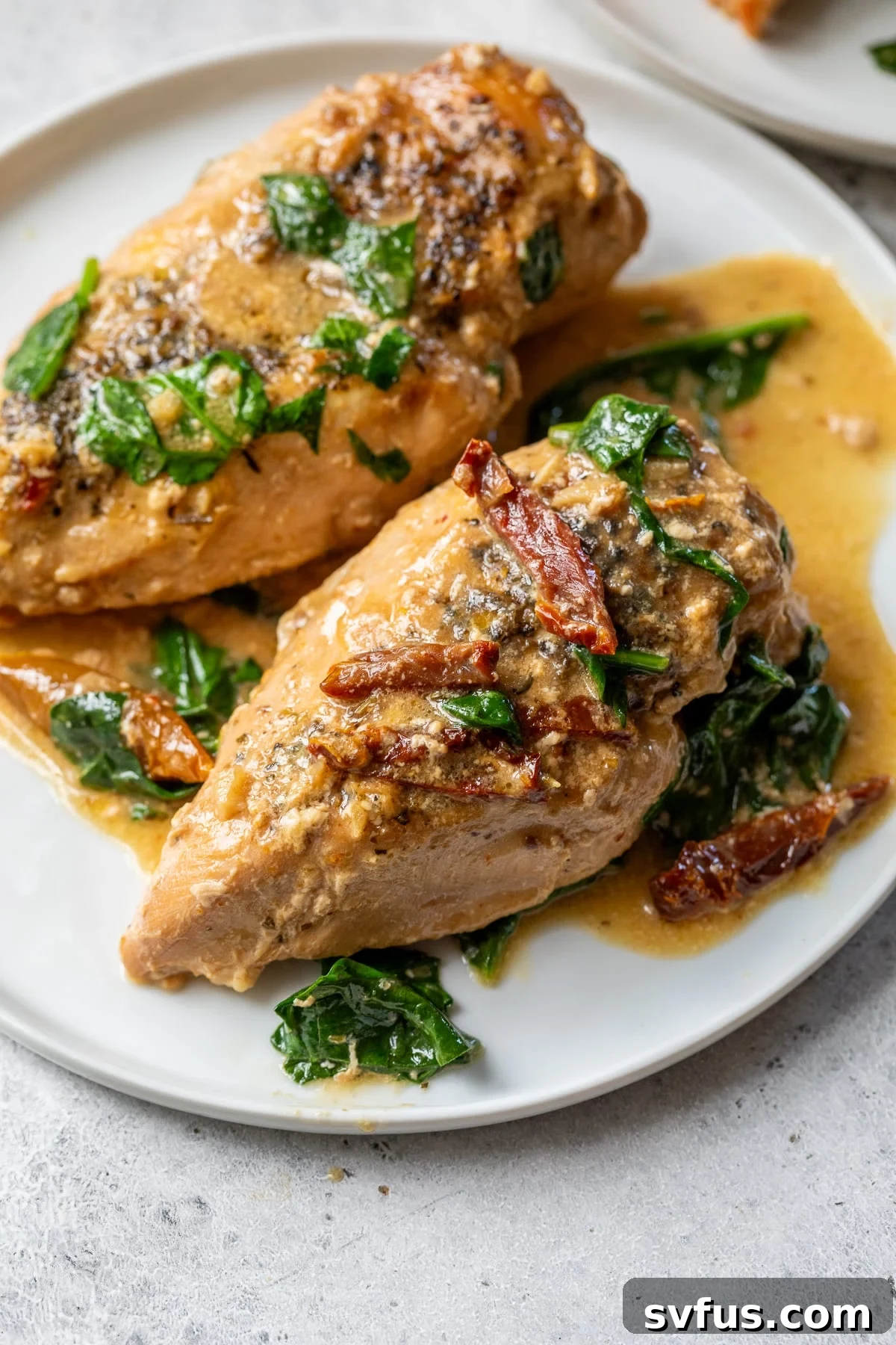 crockpot tuscan chicken on a plate