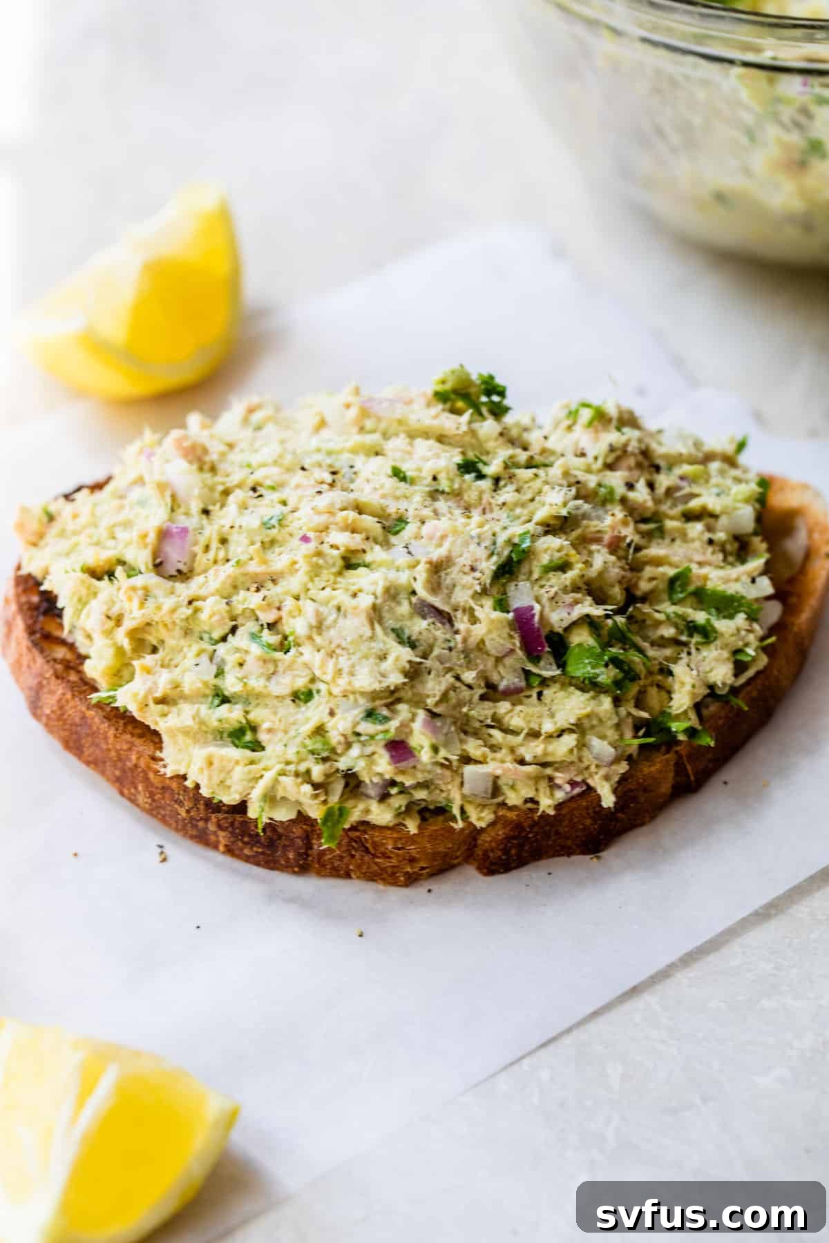 avocado tuna salad on a piece of toast