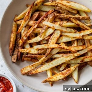 A bowl of air fryer french fries.