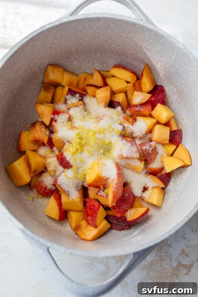 Raw ingredients for Peach Preserves in a large pot, ready for cooking.