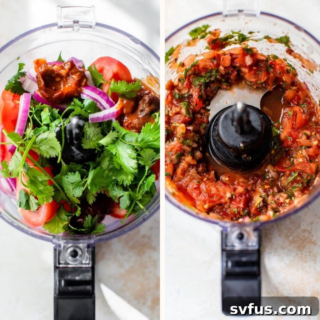 Freshly prepared chipotle salsa with tomatoes, cilantro, and chipotle peppers in a food processor, ready to be pulsed.