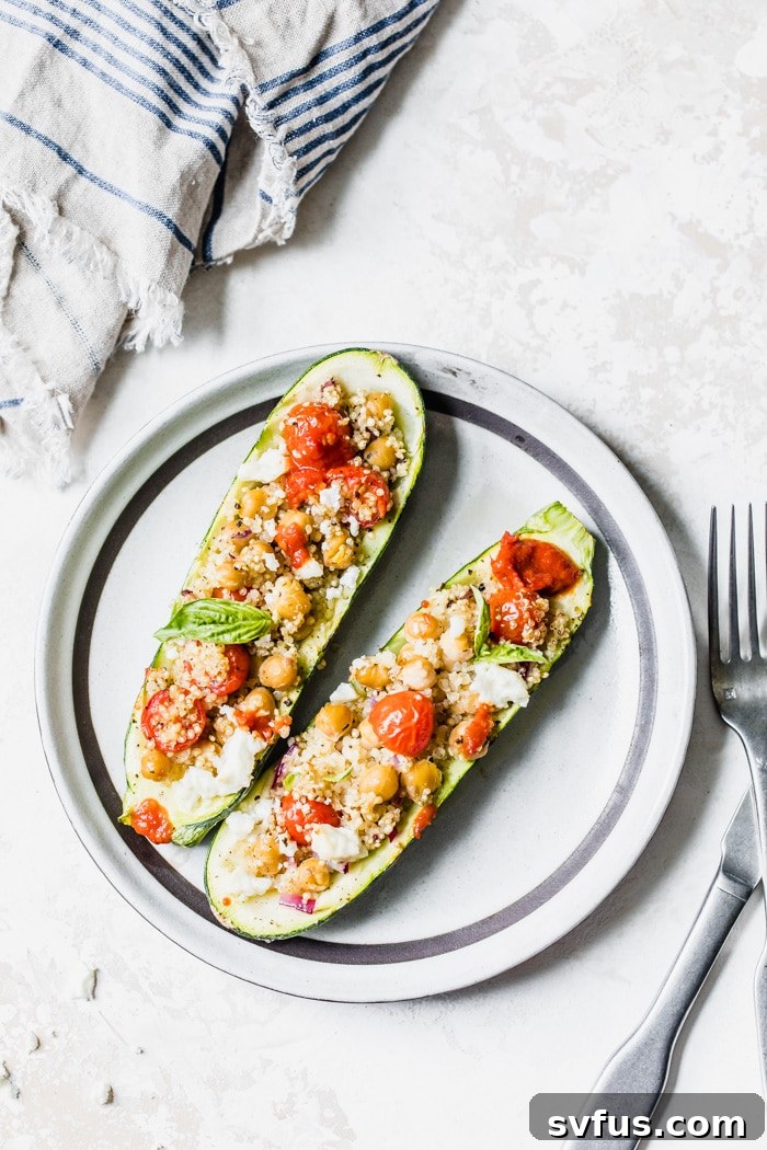 Close-up of Mediterranean zucchini boats filled with hearty quinoa mixture
