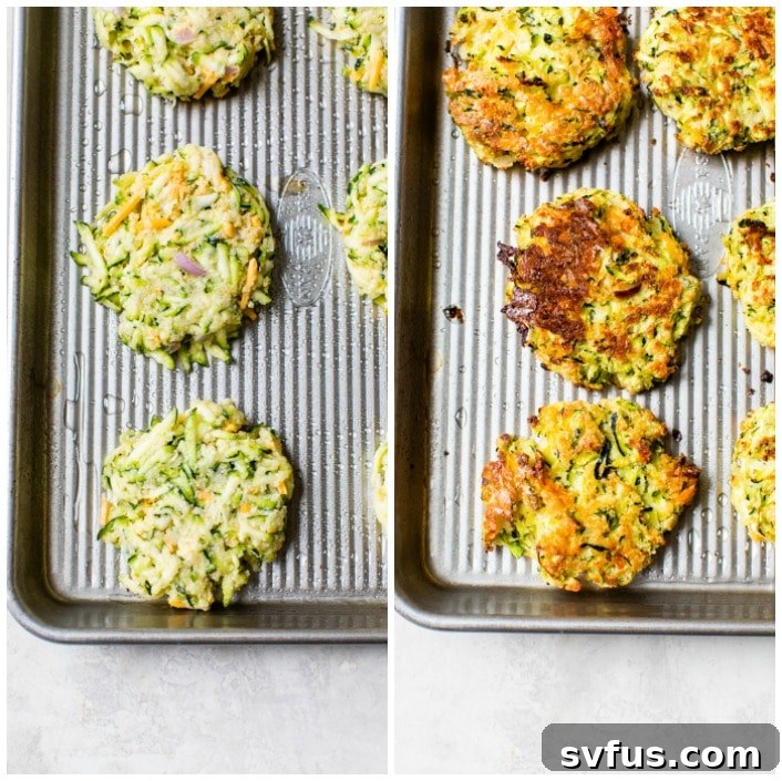 golden-brown zucchini fritters baking on a parchment-lined baking sheet, evenly spaced and looking crispy