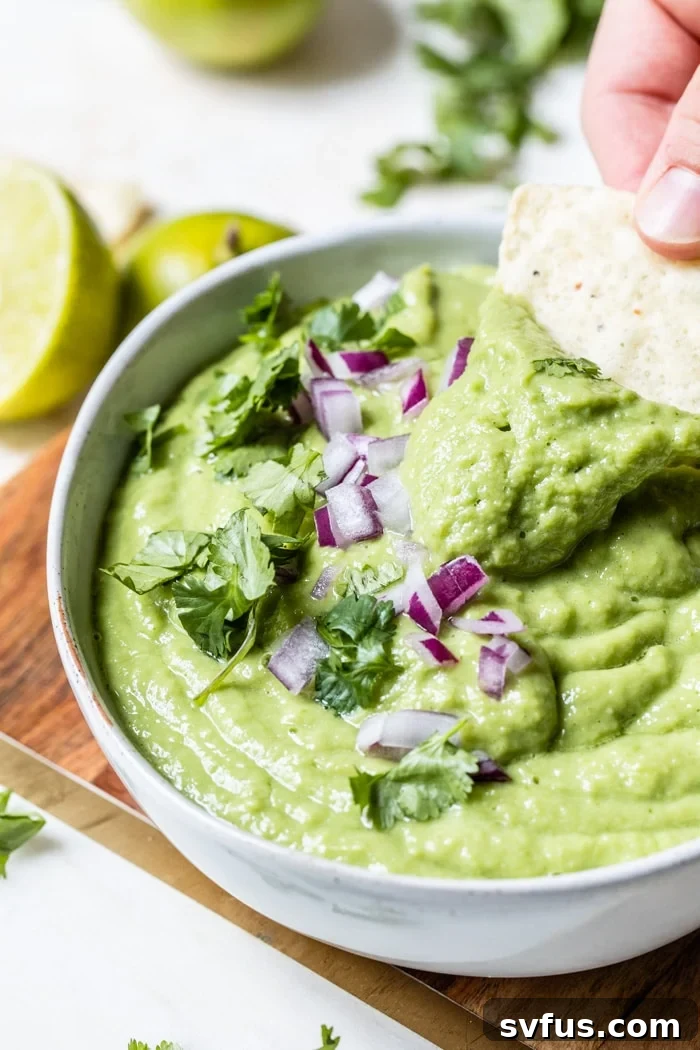Creamy Guacamole Salsa: a blend of guacamole and salsa verde, perfect for dipping or drizzling.