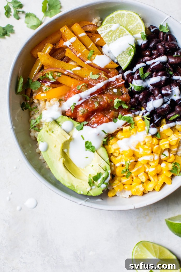 A healthy and vibrant vegan burrito bowl featuring a colorful array of fresh ingredients like rice, black beans, corn, salsa, and avocado, perfect for meal prep.