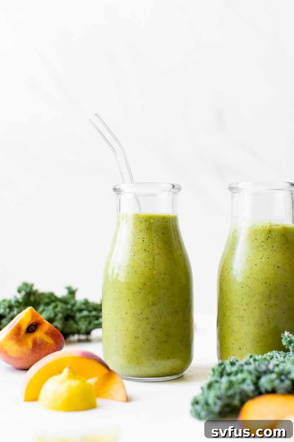 Glass of vibrant green kale smoothie