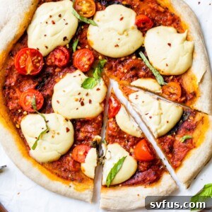 vegan pizza on parchment paper
