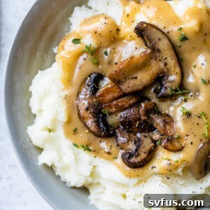 mushroom gravy on top of mashed potatoes