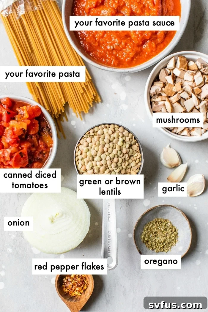 Individual bowls holding various ingredients like diced onions, garlic, mushrooms, lentils, and canned tomatoes.
