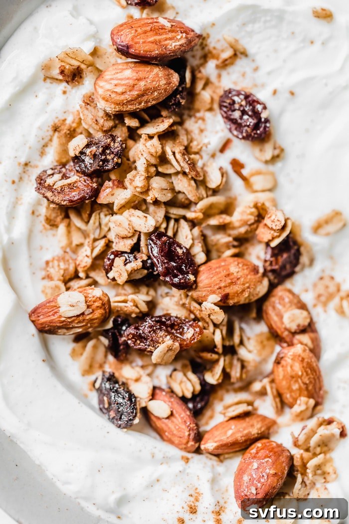 A delicious bowl of homemade cinnamon raisin granola, ready in just 25 minutes and perfect for lasting all week long. This crunchy, flavorful granola is ideal for a quick breakfast or topping.