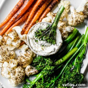 Charred vegetables with creamy garlic whipped goat cheese dip, a healthy and flavorful snack.