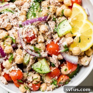 chickpeas in a bowl with vegetables and tuna