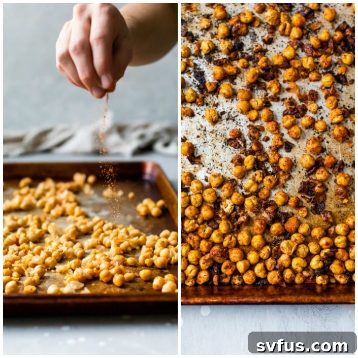 Crispy seasoned chickpeas spread in a single layer on a baking sheet, golden brown and perfectly roasted.