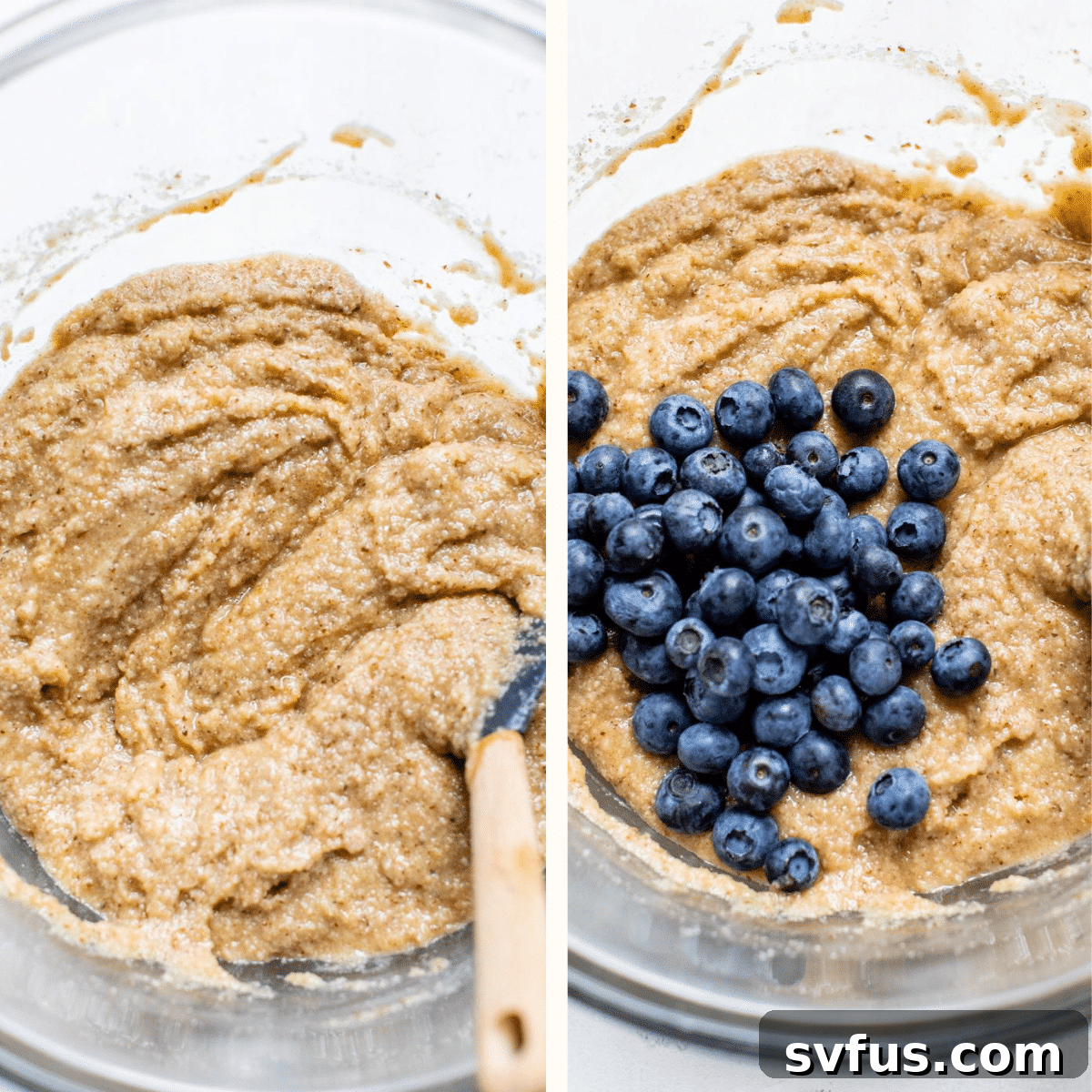 Close-up of blueberry muffin batter in a bowl with fresh blueberries folded in, ready for baking