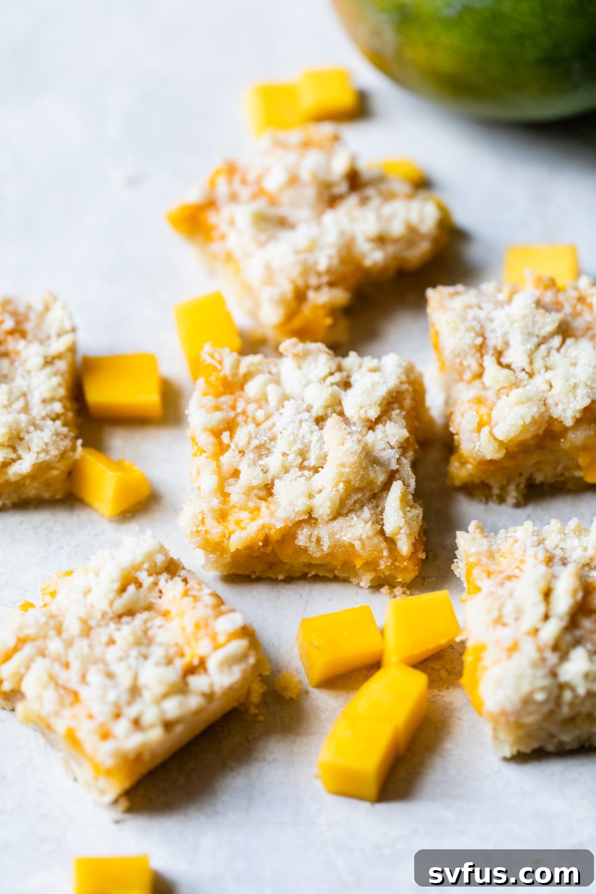 Delicious and Easy Mango Crumb Bars with a buttery crust and fresh mango coconut topping
