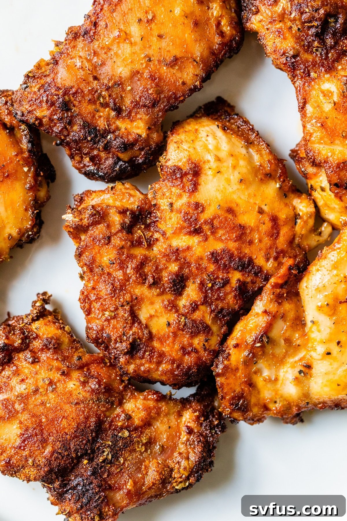 crispy chicken thighs on a plate