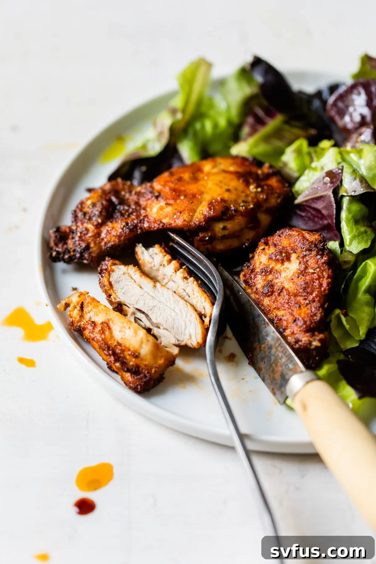 chicken and salad on a plate