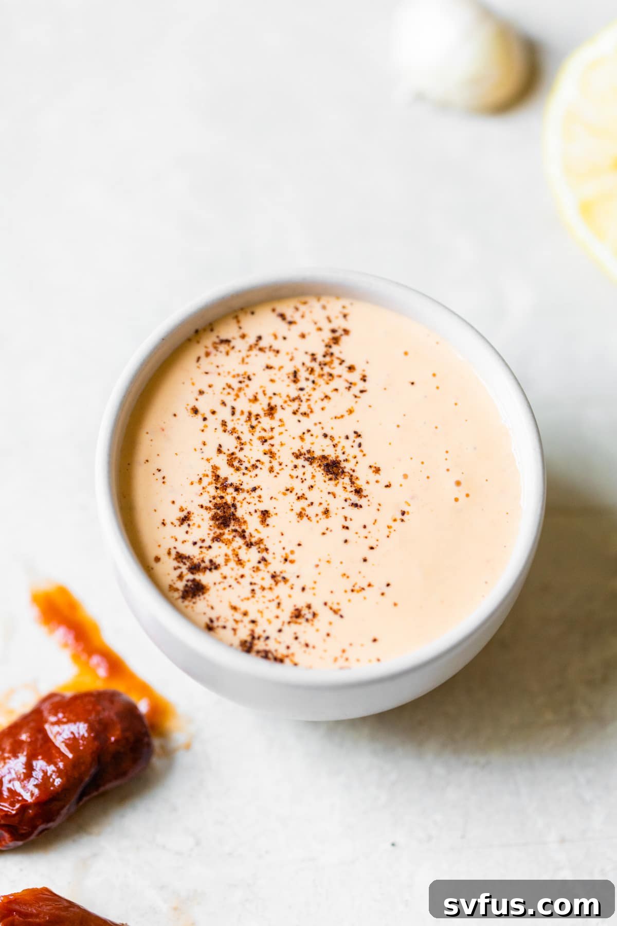 orange mayo in a small bowl