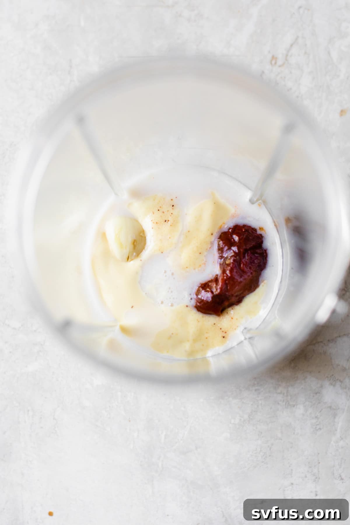 aioli ingredients in a blender