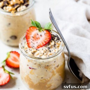 jar of oats with peanut butter and strawberries