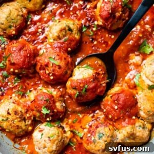 meatballs in a skillet with pasta sauce