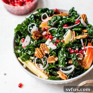 A detailed close-up of the prepared Winter Kale Salad in a serving bowl, showcasing its fresh ingredients and vibrant colors.